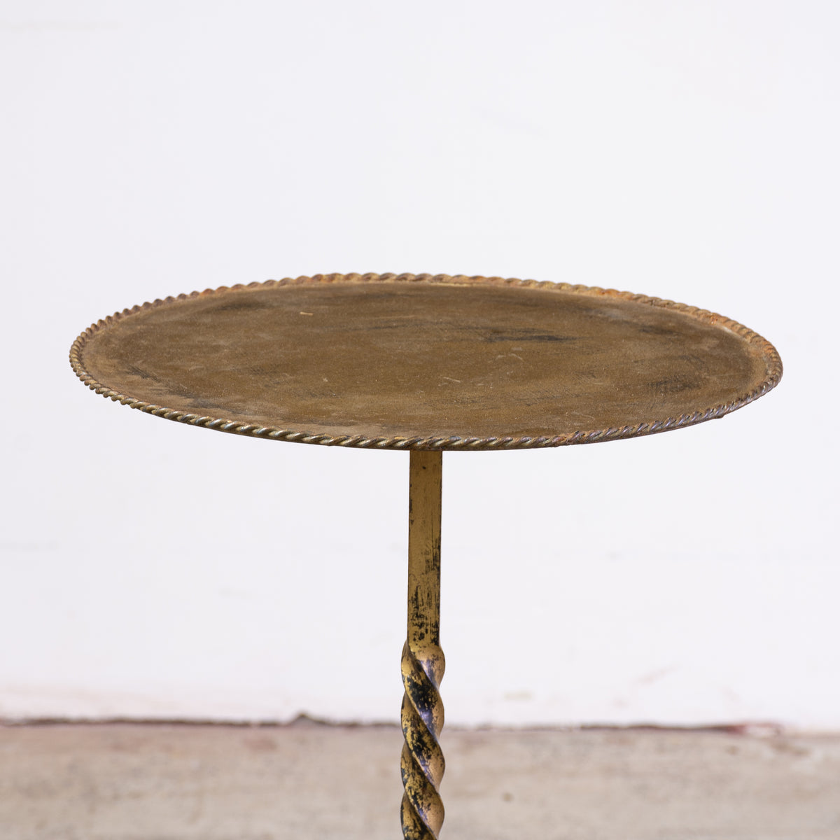 A Giltmetal Spanish Martini Table on three Legs The Vault Sydney