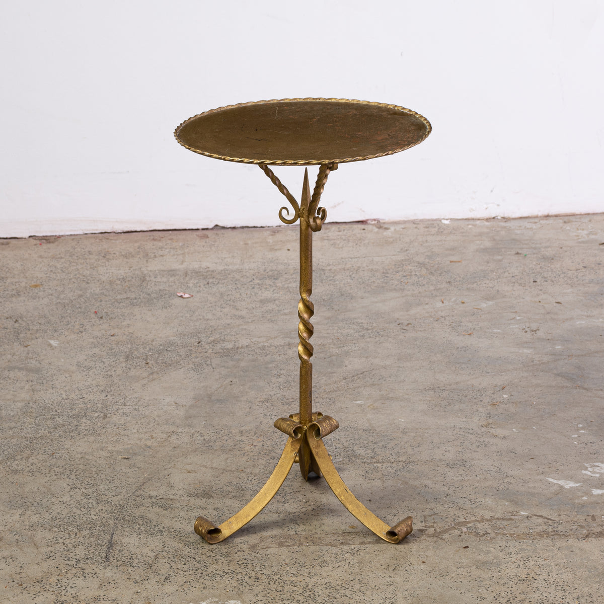 A Giltmetal Spanish Martini Table on three Legs The Vault Sydney
