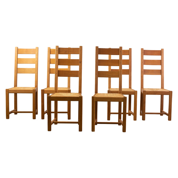 A set of Six Arts and Crafts Oak Chairs