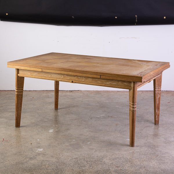 A 1940s Cerused Oak Extendable Dining Table in the manner of Charles Dudouyt