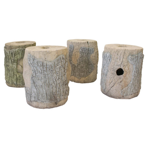 A Set of Four French Faux Bois Cement Stools