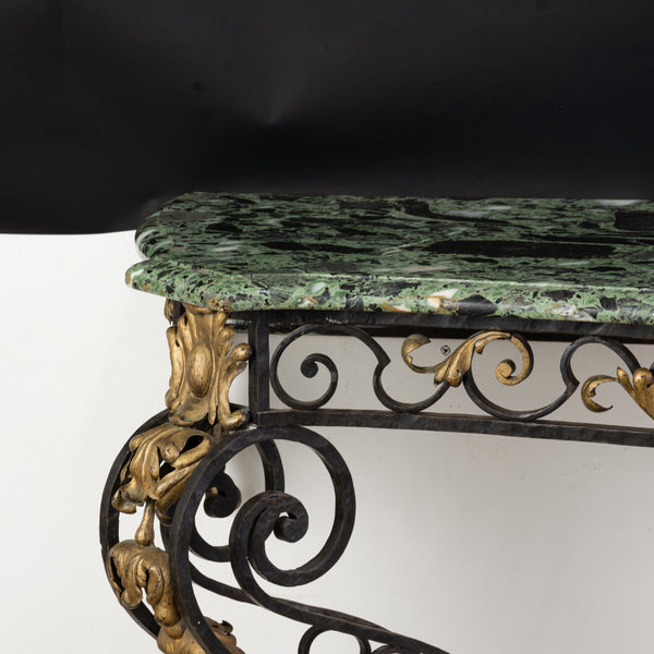 A Large Wrought Iron Table with Verde Marble Top