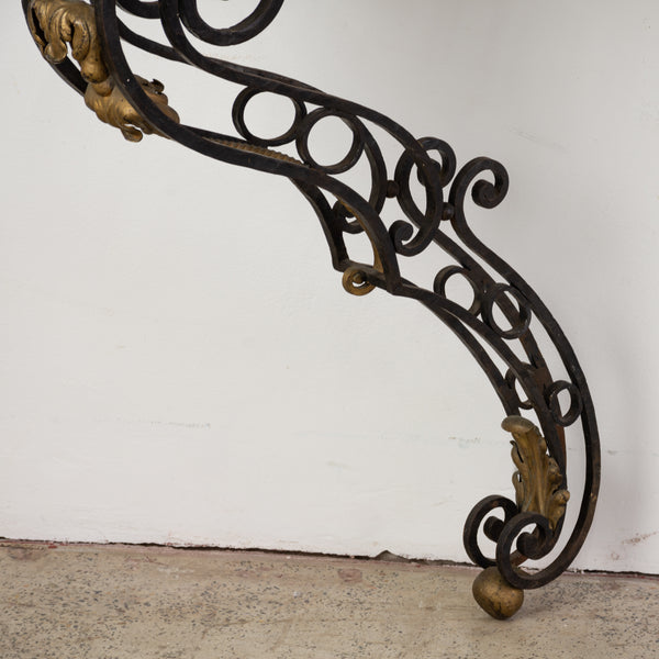 A Large Wrought Iron Table with Verde Marble Top