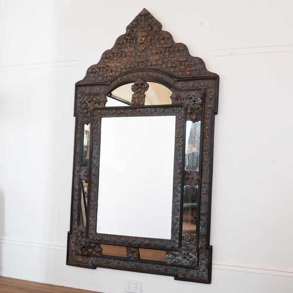A large Flemish Baroque Repousse Brass Cushion Mirror