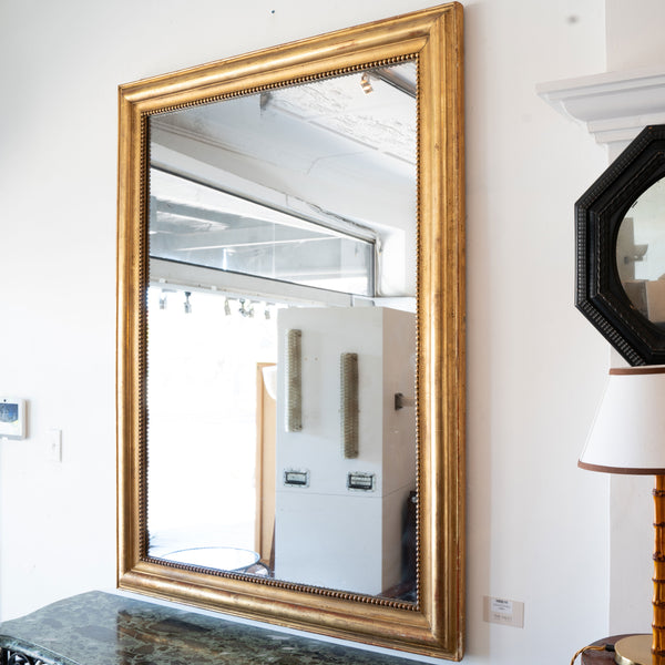 A Large Louis Philippe Giltwood Overmantel Mirror with Beaded Edge