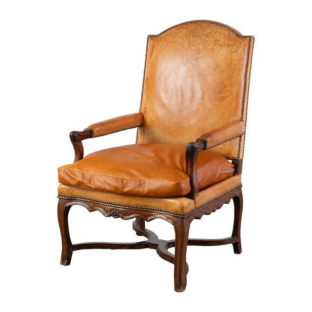 A Regence Fauteuil Upholstered in Cognac Leather