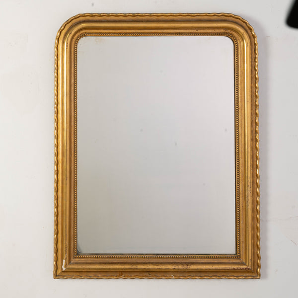 A Louis Phillipe Giltwood Overmantel Mirror with Scalloped Edge