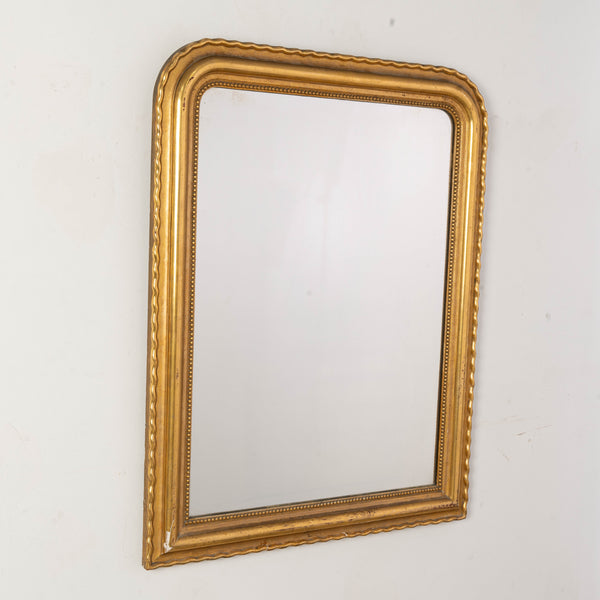 A Louis Phillipe Giltwood Overmantel Mirror with Scalloped Edge