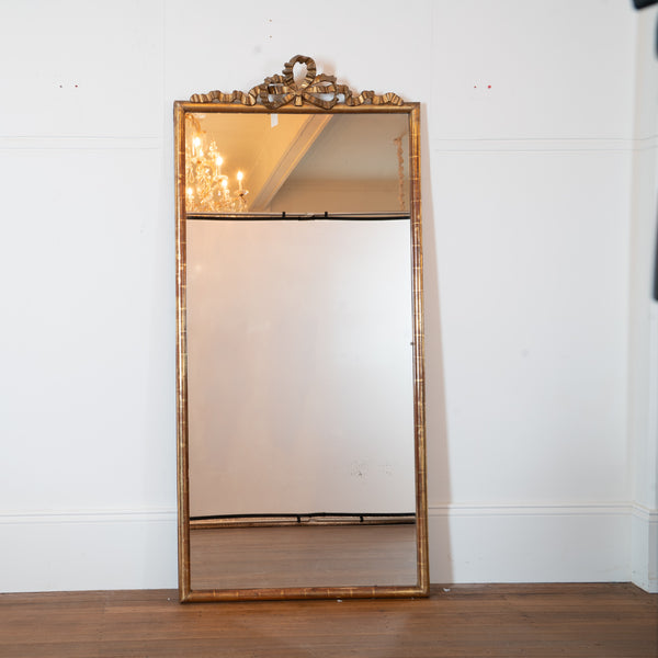 A Louis XVI Style Giltwood Mirror with Ribbon-Tied Cresting, French, Late 19th / Early 20th Century