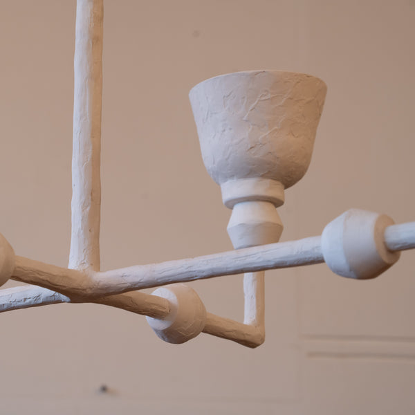 A Four-Light Textured White Plaster Chandelier, in the Manner of Alberto Giacometti