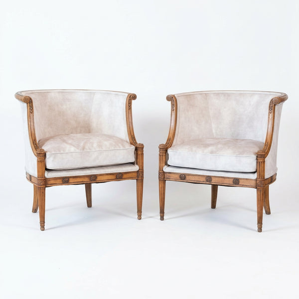 A Pair of French Directoire Style Carved Beechwood Bergères en Gondole, Late 19th / Early 20th Century
