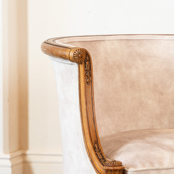 A Pair of French Directoire Style Carved Beechwood Bergères en Gondole, Late 19th / Early 20th Century