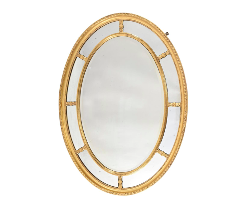 A 19th Century George III Style Oval Giltwood Mirror in Paraclose