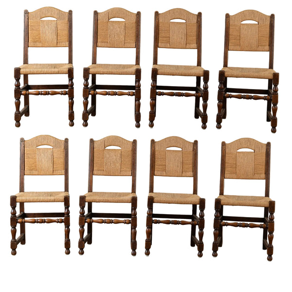 A Set of Eight French Oak and Rush Dining Chairs
