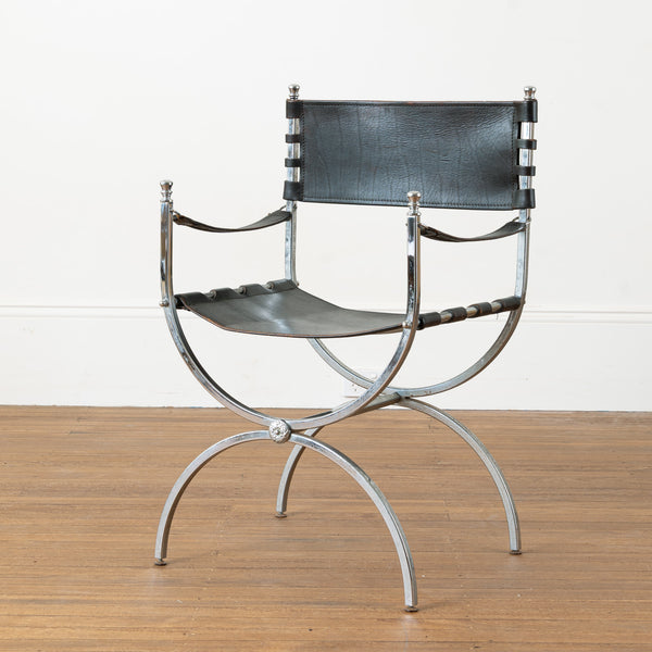 A Chrome and Black Leather Curule Armchair in The Manner of Maison Jansen