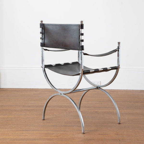 A Chrome and Black Leather Curule Armchair in The Manner of Maison Jansen