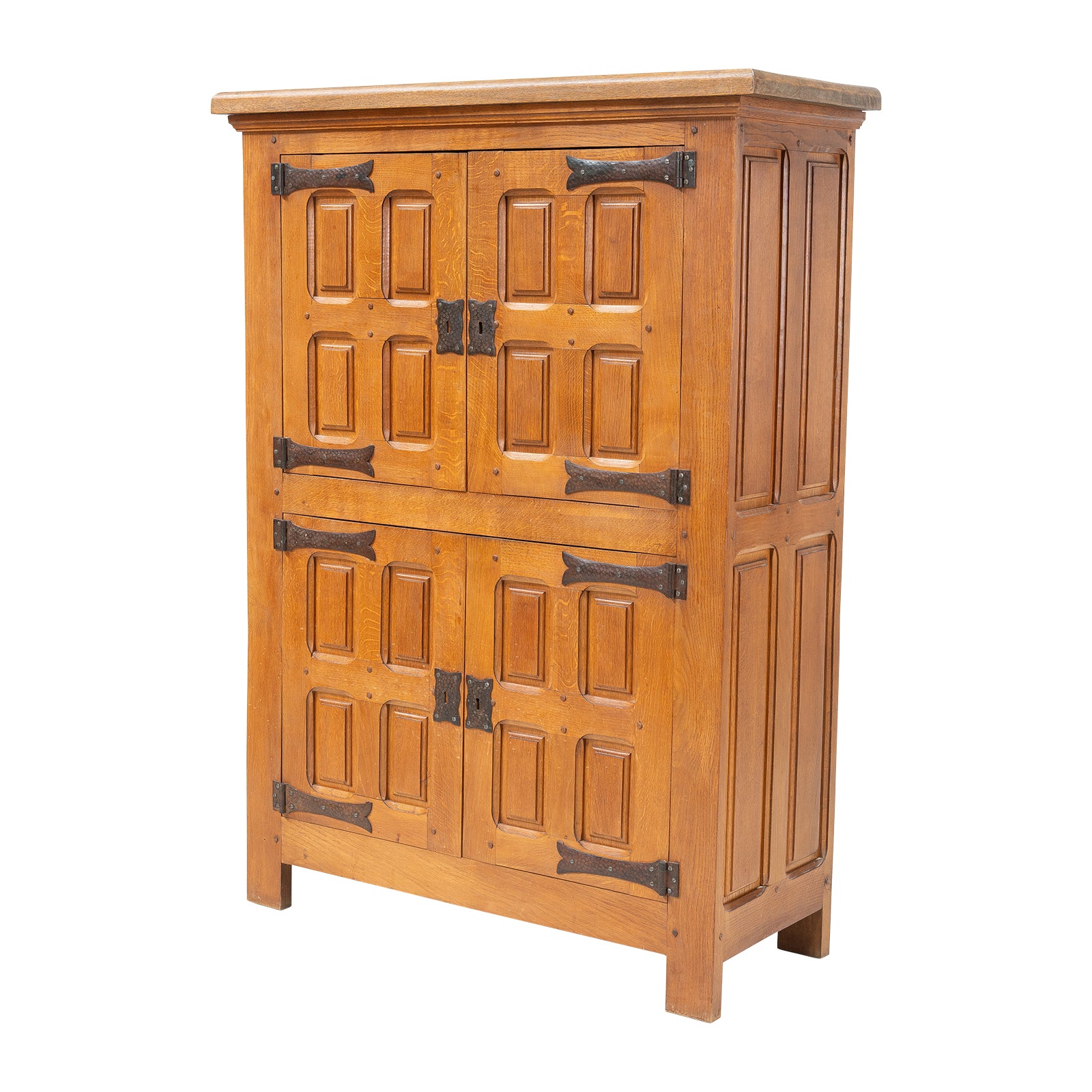 Wooden cabinet with panel design and metal handles on a white background