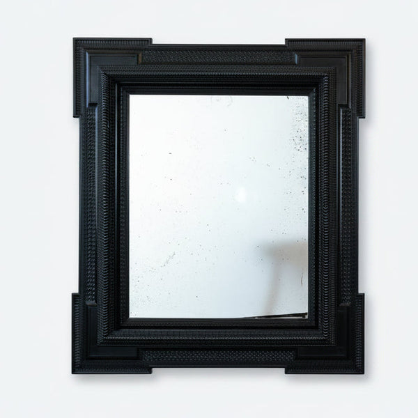 A Large 19th Century Italian Ebonised Square Mirror with outset corners