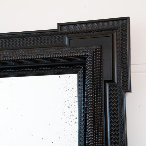 A Large 19th Century Italian Ebonised Square Mirror with outset corners