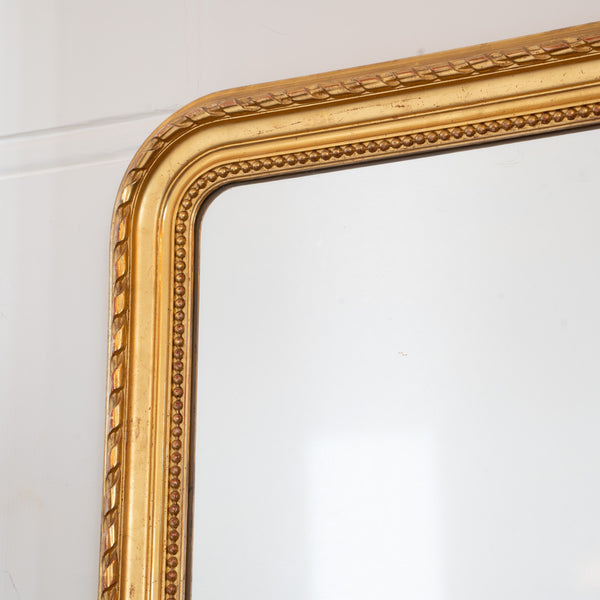 A Large French Louis-Philippe Period Giltwood and Gesso Overmantel Mirror