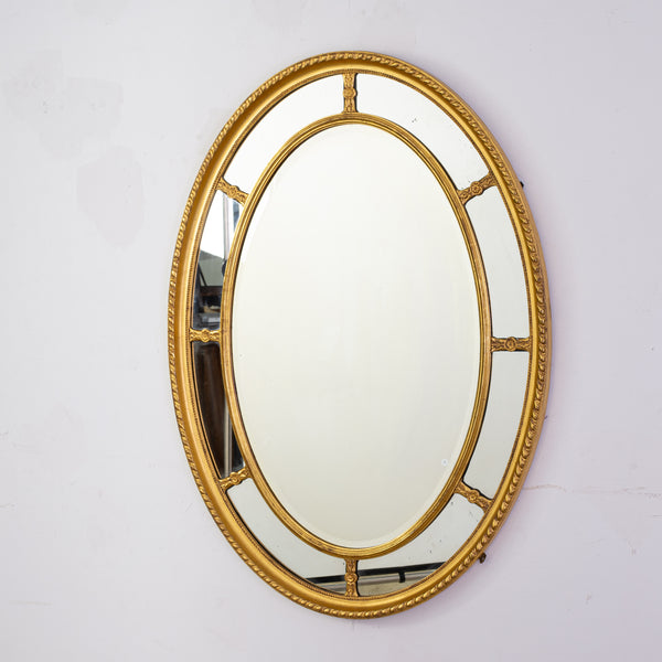 A 19th Century George III Style Oval Giltwood Mirror in Paraclose