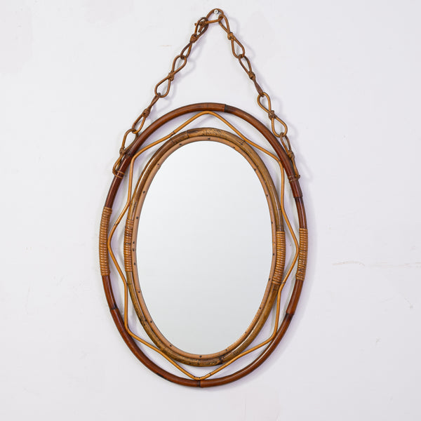 A 1970s Oval Wicker Mirror with wicker Chain