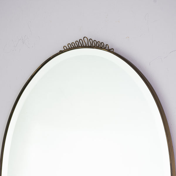 A Mid Century Oval Circular Mirror Pierced Cresting