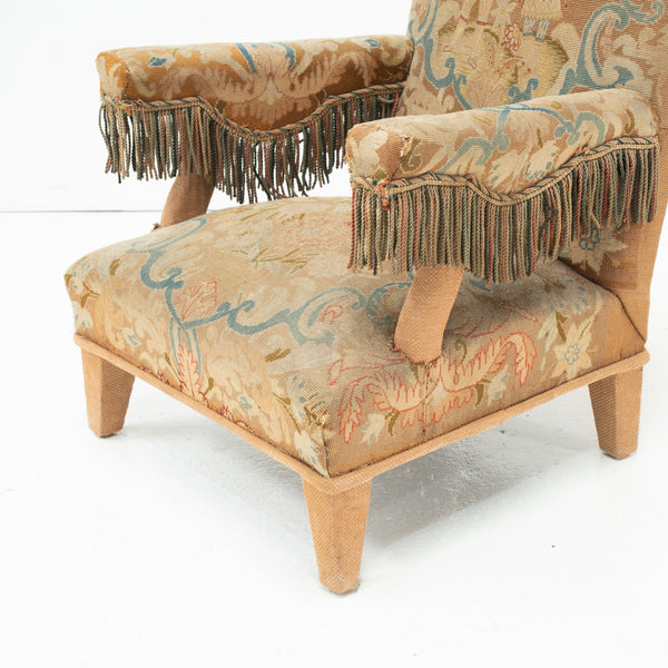 A 19th Century Low Tapestry Covered Armchair