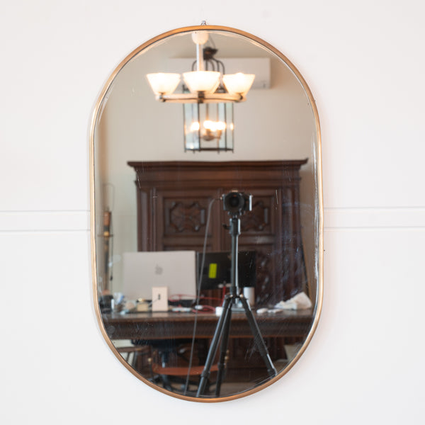 A 1970s Italian Oval Brass Mirror
