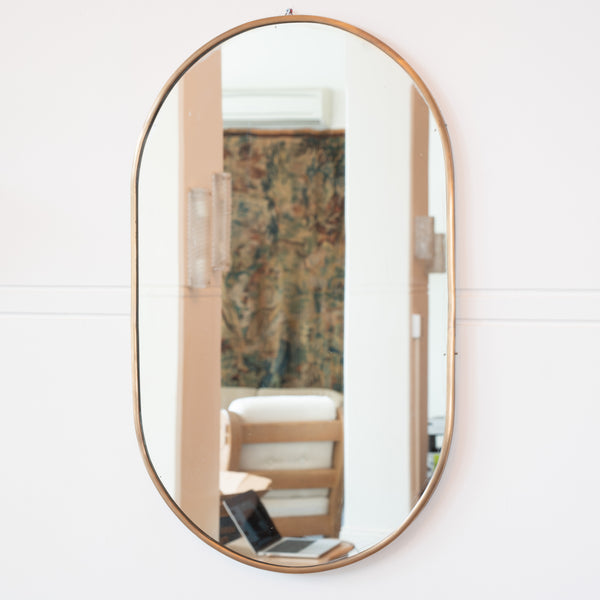 A 1970s Italian Oval Brass Mirror