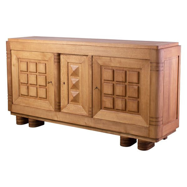 A Large Oak Sideboard in the manner of Charles Dudouyt