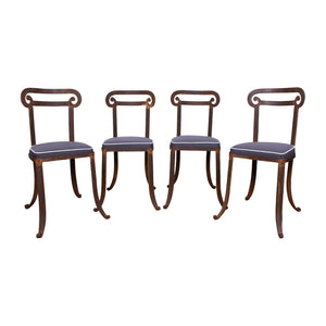 A Set of Four Klismos Style  Cast Iron Chairs