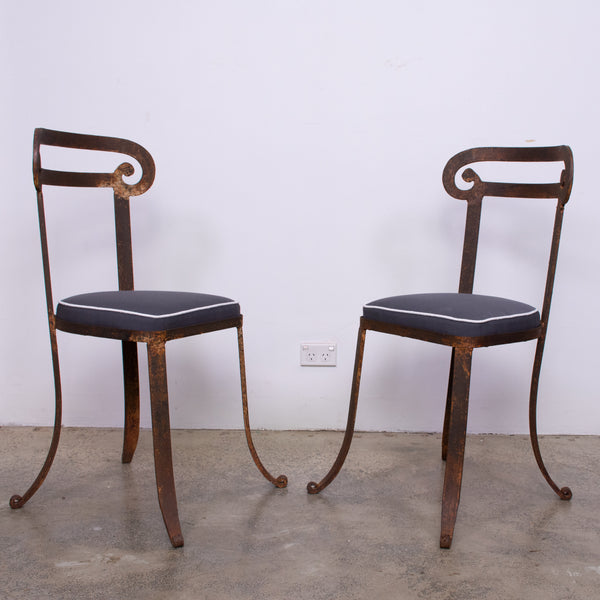 A Set of Four Klismos Style Forged Iron Chairs