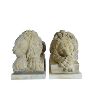 Pair of cast stone lions