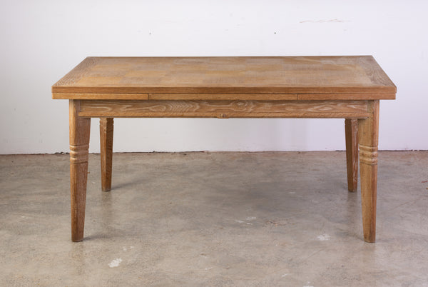 A 1940s Cerused Oak Extendable Dining Table in the manner of Charles Dudouyt