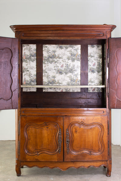 A Provincial Louis XV Armoire in Panelled cherrywood