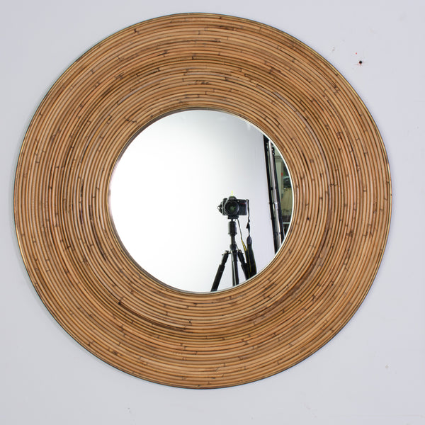 A Vintage Circular Pencil Reed Mirror