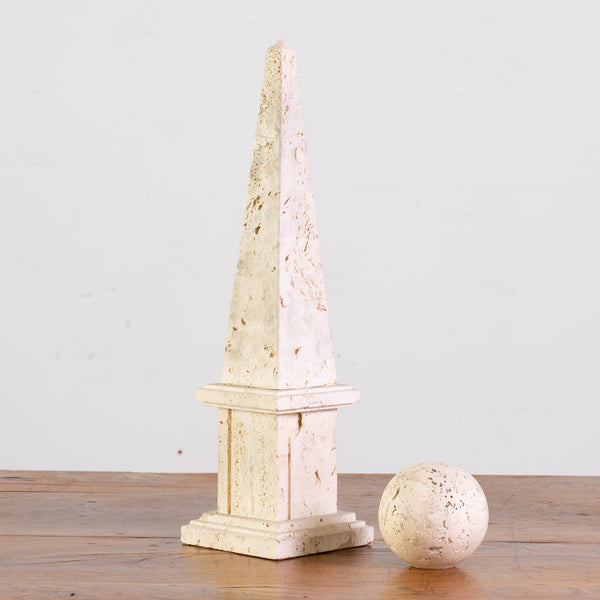 A Travertine Obelisk and Ball