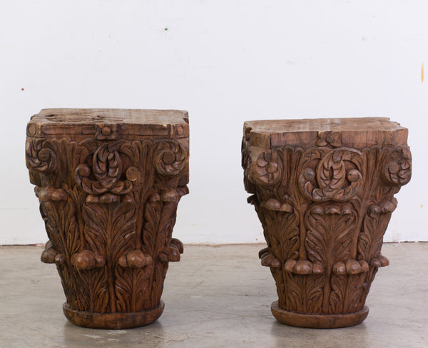 A Near Pair of Antique Wooden Capitals