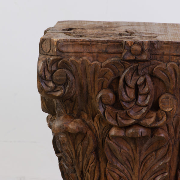 A Near Pair of Antique Wooden Capitals