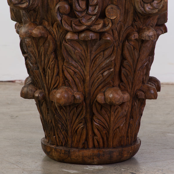 A Near Pair of Antique Wooden Capitals