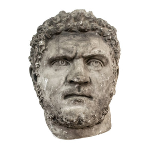 A 19th century plaster bust of Hercules