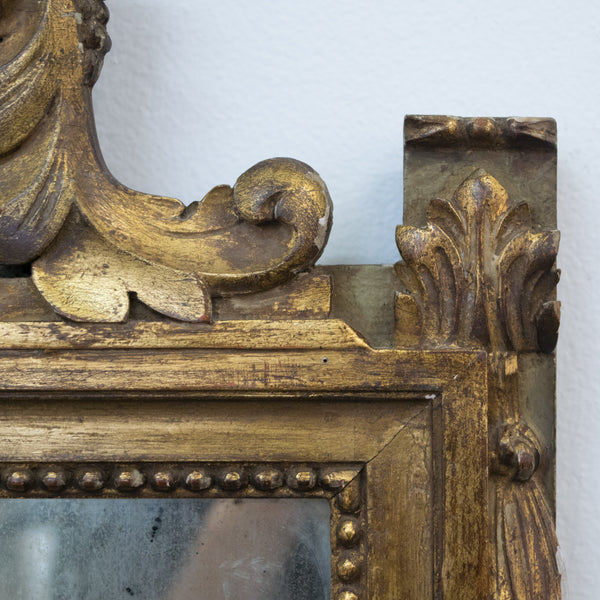 A small Louis XVI style carved and gilded wall Mirror