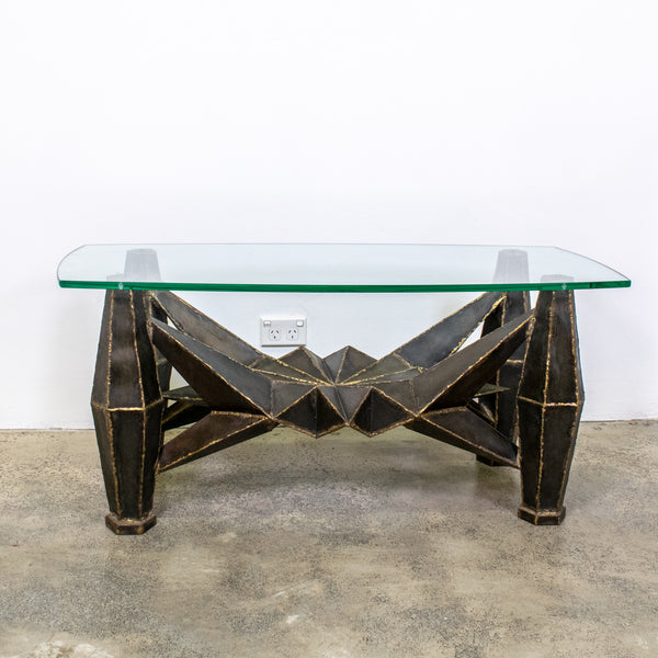 Metal brutalist coffee table with glass top