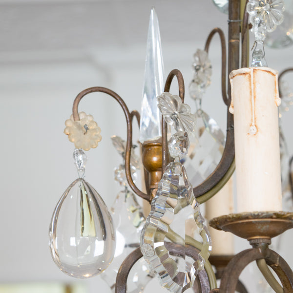 A Louis XV style Bronze and Crystal 8 Light Chandelier