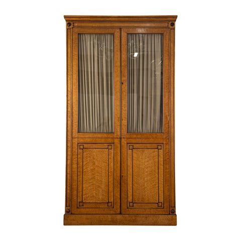 A Charles X Birdeye Maple Armoire