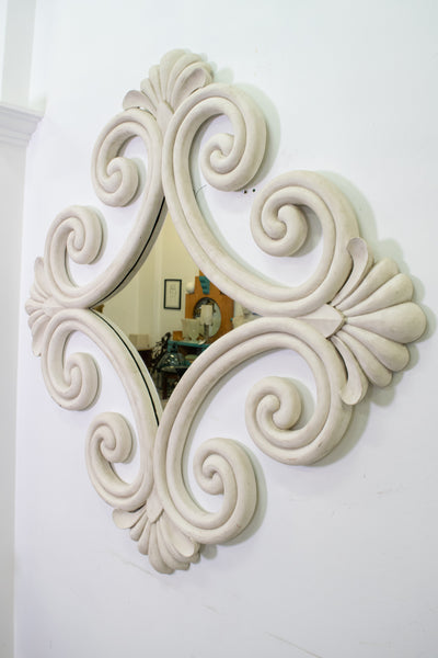 A Large French Carved Scroll Mirror