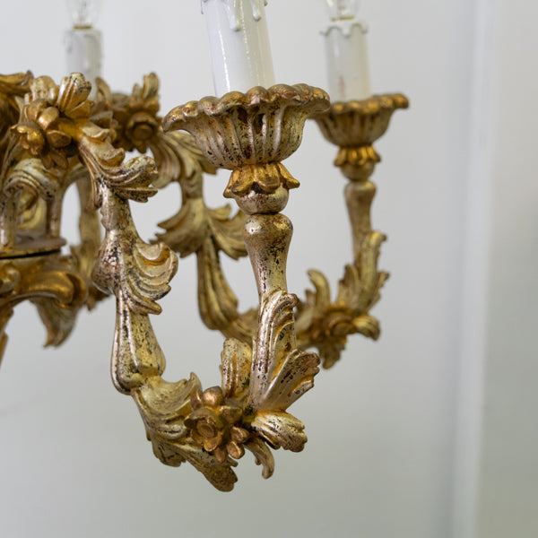 A Florentine Carved and Giltwood 6 Light Chandelier
