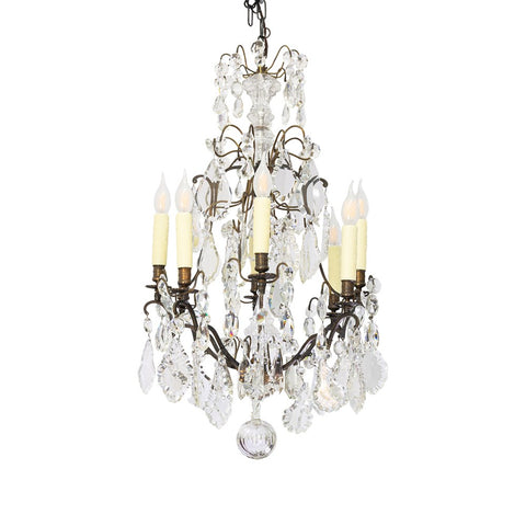 A French Louis XVI style bronze and cut crystal chandelier