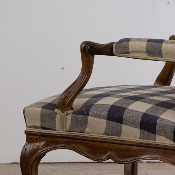 Pair of walnut armchairs with flat violin backs, backward armrests
